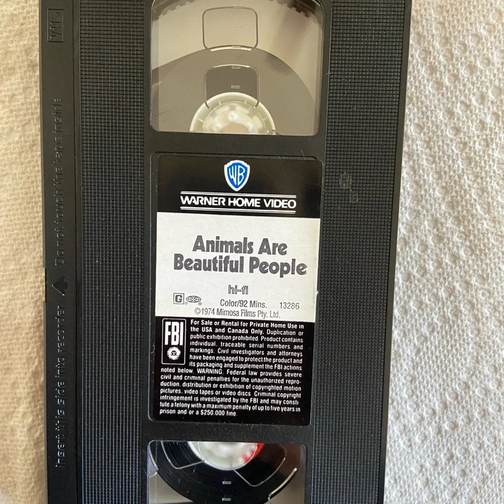 Warner Bros. VHS - Animals Are Beautiful People with Orange and Black Cover